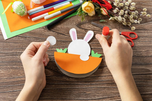 istock Instructions, step 7. Easter card gift Easter bunny. Handmade. Project of children's creativity, handicrafts, crafts for kids. 1456220293