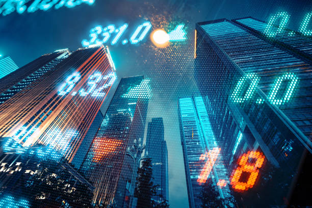Stockmarket and investment theme background with City skyscraper stock photo