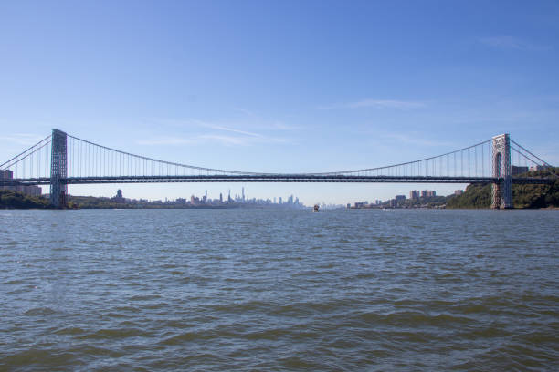 Governor Mario M. Cuomo Bridge over the Hudson River Hudson River, New York, USA - October 06, 2022: Governor Mario M. Cuomo Bridge spans the Hudson River. It is a twin cable-stayed bridge between Tarrytown and Nyack in New York State. hudson river stock pictures, royalty-free photos & images