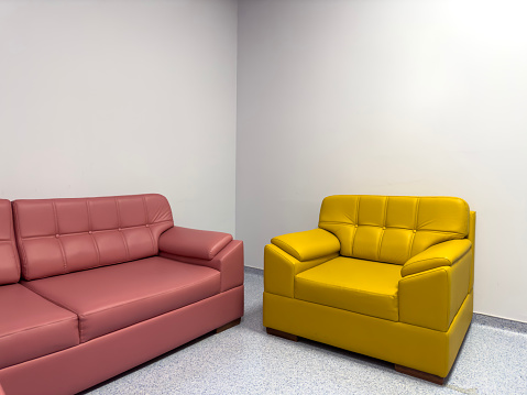 Pink and yellow  leather sofa