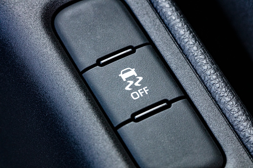 car traction control button