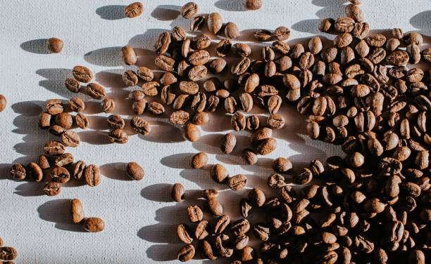コーヒー豆の背景 - coffee ground bean whole ストックフォトと画像