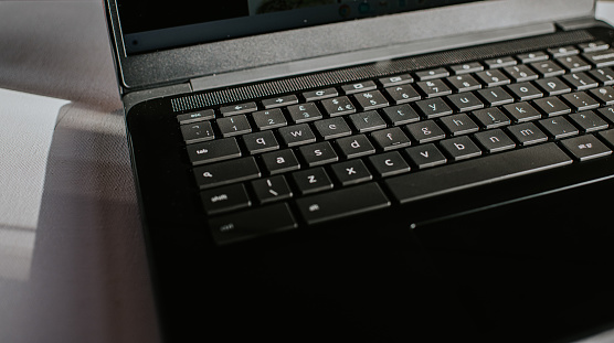 Close-up of a black laptop computer