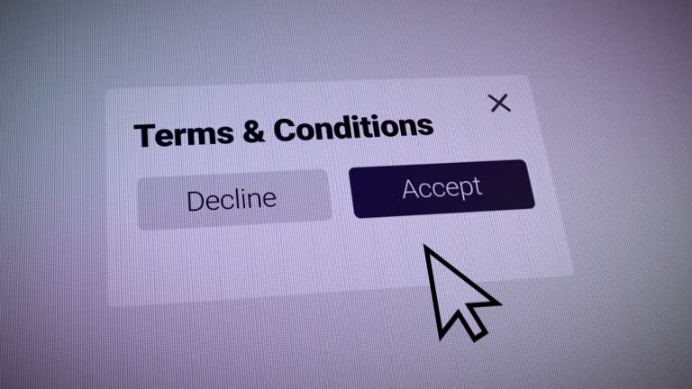 The mouse cursor slides over and clicking the Accept the terms and conditions box on the web page. Device pixelated screen notification. User experience on internet network website.