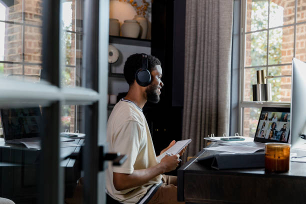 istock Young adult male taking notes 1456237358