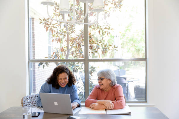 istock Friends sit at the dining room table 1456237432