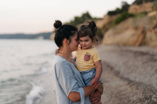 istock Evening walks at the beach with my daughter 1456238864