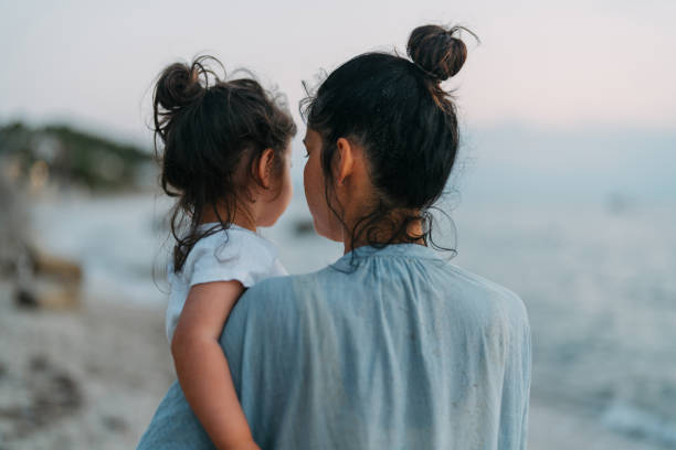 istock Evening walks at the beach with my daughter 1456238968