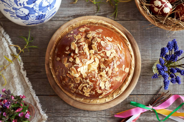 Mazanec, Czech sweet Easter pastry, with Easter eggs and pomlazka - typical Czech Easter whip