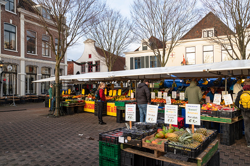 Amersfoort, Netherlands, January 7, 2023; Market stall with fruit and vegetables on the city square De Hof in Amersfoort.