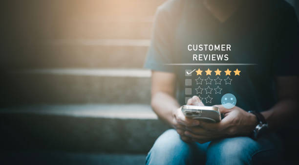 istock Man touch smartphone with Customer review satisfaction feedback survey concept, User give rating to service experience on online application, service leading to reputation ranking of business. 1456259261