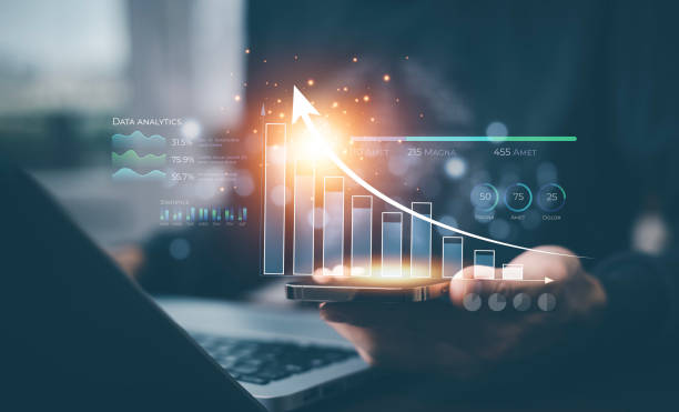 istock Changes in new planning and cryptocurrency concept, Businessman analyzes performance profitability of working companies with digital augmented reality graphics, positive indicators in 2023, 1456259531