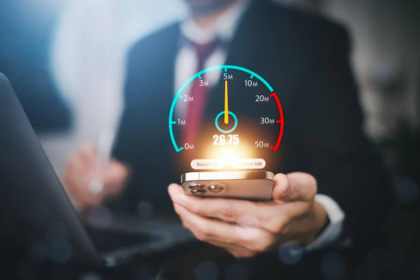 istock Fast internet connection with Metaverse technology concept, Hand holding smartphone and Virtual screen of Internet speed measurement,Internet and technology concept, 5G Hi speed internet concept 1456259540