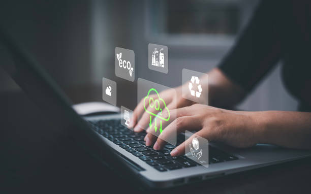 istock Businessman using laptops and touch recycle symbol with virtual modern reduce CO2 emission concept with icons, global warming emissions carbon footprint climate change to limit global warming, energy 1456260640