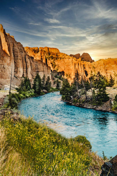 River running through a majestic nature area in the western USA Wyoming scenic stock photo