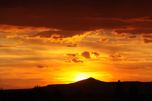 Santa Fe Sunset Bright sunset over the Santa Fe, New Mexico hills santa fe new mexico mountains stock pictures, royalty-free photos & images