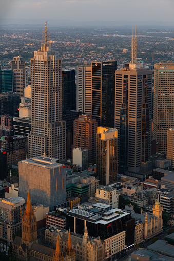 Melbourne, Australia - December 30, 2022: Sunset view of Melbourne CBD skyscrapers.