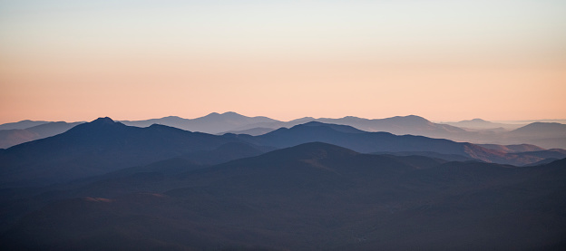 Green Mountain National Forest at sunrise from small plane in Burlington, Vermont, United States