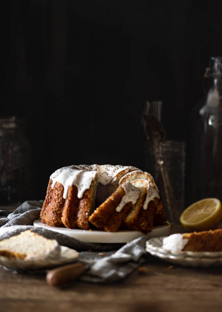 istock Slice lemon poppy seed cake table scape 1456266075