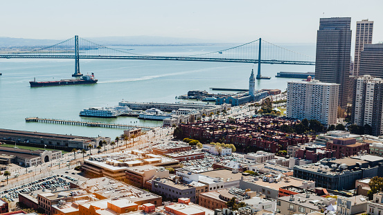 San Francisco, USA - May 18, 2022: skyline of San Francisco,CA with boats at pier near fisherman's wharf.