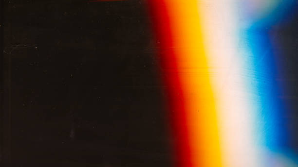 light flare old film rainbow glow dust scratches Light flare. Old film. Weathered overlay. Orange blue white rainbow color glow dust scratches noise on dark black illustration abstract empty space background. black orange audio stock pictures, royalty-free photos & images