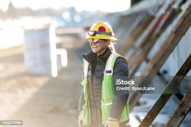 Woman Working In Construction Industry Stock Photo - Download Image Now - Construction Worker, Tradesperson, Women