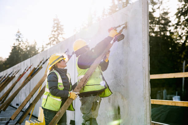 Man and Woman Working In Construction Industry stock photo