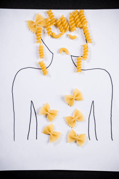 istock woman noodle concept 1456278088