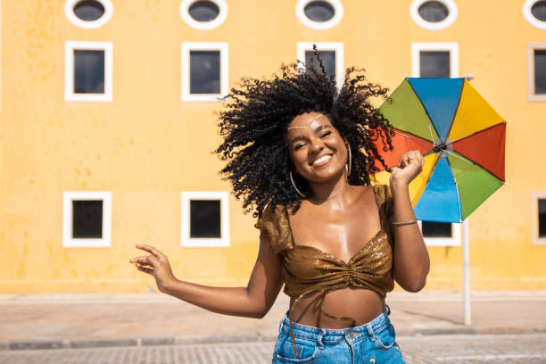 istock Dancer holding a frevo umbrella 1456280468