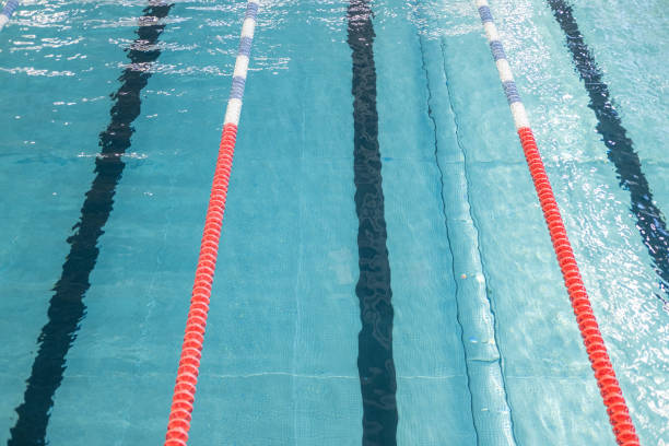 istock Swimming pool for swimming competitions. Empty Paths of a competitive swimming pool. Active swimming lessons. 1456283410