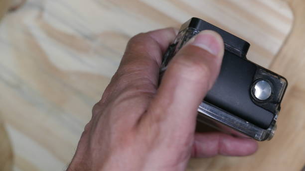 istock Man recording with an action camera 1456287508