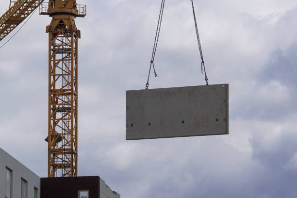 istock Low angle view of crane against cloudy sky 1456288495
