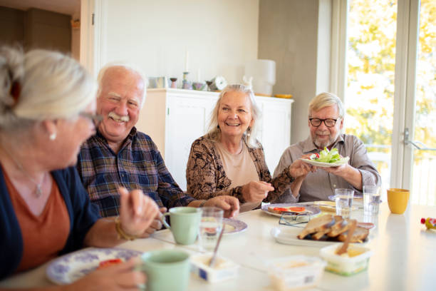 istock Small group of seniors having breakfast together 1456289521