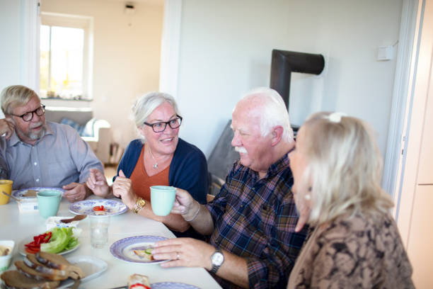 istock Small group of seniors having breakfast together 1456291225