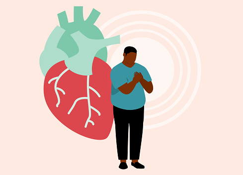 One Overweight Black Man With Hand On Chest Having A Heart Disease. Heart Attack. Isolated On Color Background.