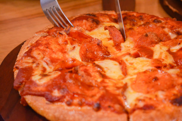 istock pizza; cheese; pepperoni; tasty; slice; food 1456294531