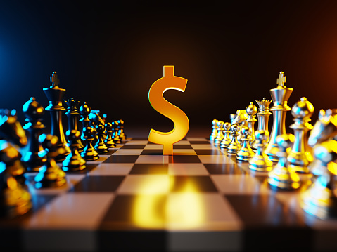 Dollar Sign US Currency Chess pieces on a chessboard Finance Concept