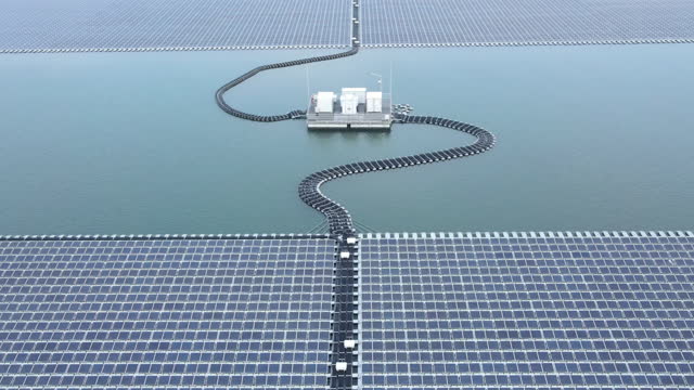 Aerial View Of Solar Panel On The Water