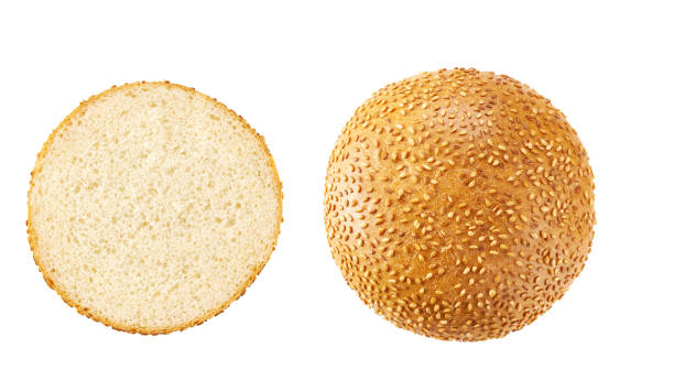 istock burger bun isolated on white background, top view. 1456306766