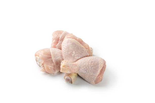 istock Fresh uncooked raw chicken legs drumsticks isolated on a white background with clipping path, cut out. 1456314579