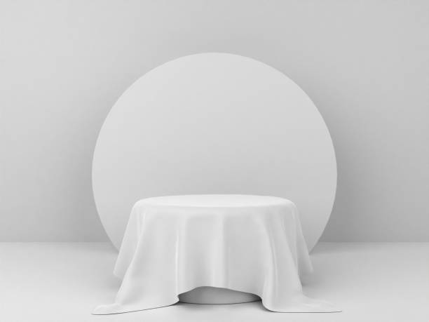 istock 3D minimalist podium background with white cloth for product display. Geometric background with pastel color and empty podium. 3D render. 1456315246