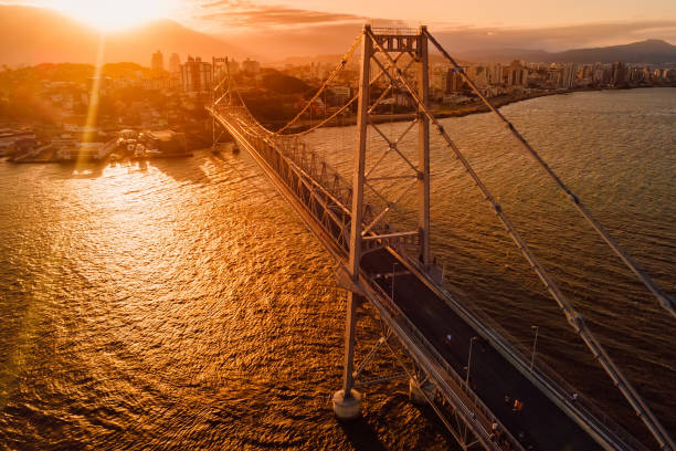 istock Old cable bridge with sunset light in Florianopolis, Brazil. Aerial view 1456318772