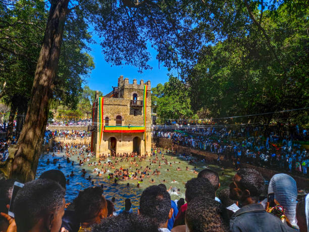 Fasilides' Bath Gondar,Ethiopia Just outside the heart of the Gondar, past the river Qaha, lies one of Ethiopia's most sacred sites. Still in use today, Fasilides' Bath is an important cultural and historic monument that plays an important role during the Ethiopian festival of Timket. ethiopian orthodox church stock pictures, royalty-free photos & images