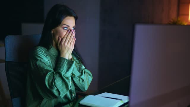 Frustrated Businesswoman Looking At Her Computer Screen