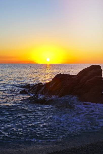 istock Sunset on the rocky shore. 1456324261