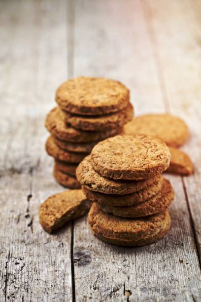 istock Fresh oat cookies on rustic wooden table. 1456324705