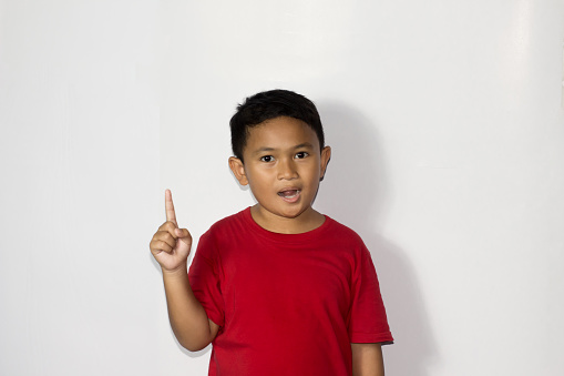 portrait Asian boy wear casual shirt on isolated white background