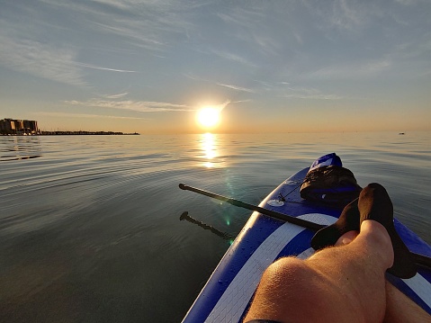 Just a beautiful sunrise on the water on Lake Ontario, with the water as reflective as a mirror.