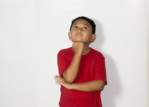 portrait Asian boy wear casual shirt on isolated white background