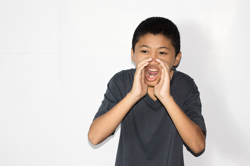 boy scream with isolated white background